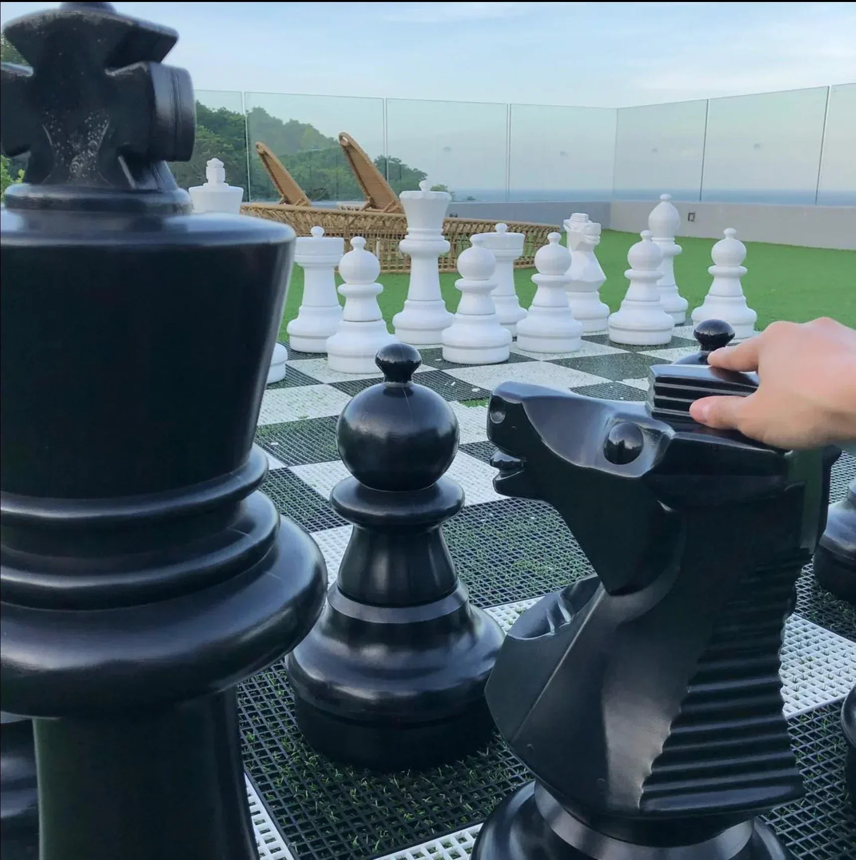 mega chess set in a yard