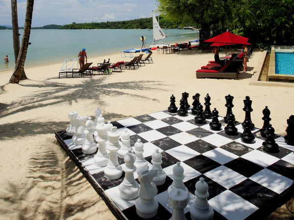 The Village Coconut Island Beach Resort Sports a MegaChess Plastic Giant Chess Set with a 25 Inch King